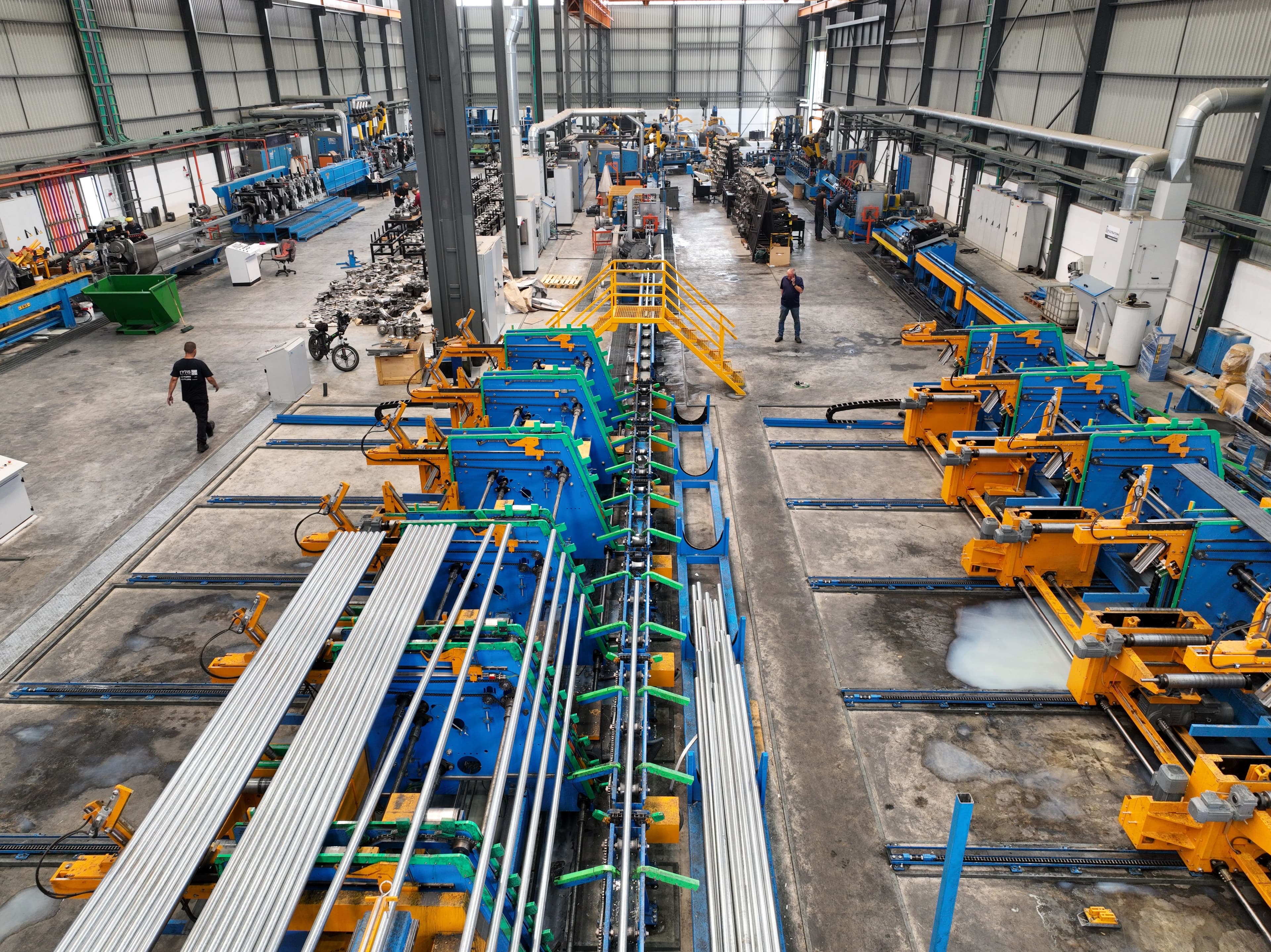 Industrial machinery operating inside a manufacturing facility